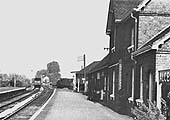 View of the junction with the Great Western Railway's branch line to Bearley with the GWR water tower and locomotive shed to its right
