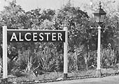 View of the junction with the Great Western Railway's branch line to Bearley with the GWR water tower and locomotive shed to its right