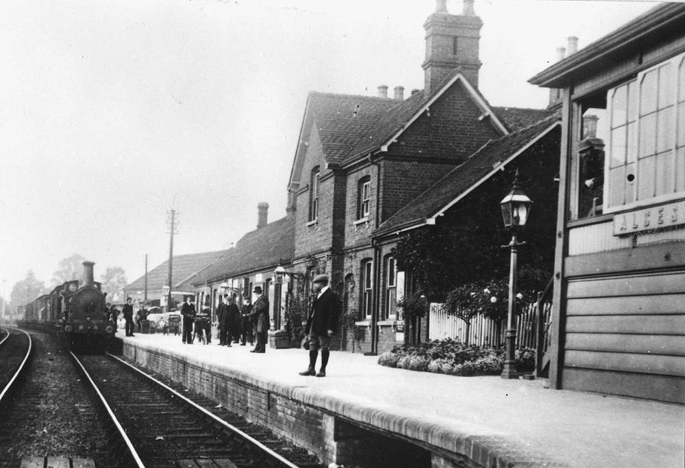 A later view of the Midland Railway's Kirtley double framed 0-6-0 locomotive at the head of the goods train passing through the station