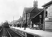 A later view of the Midland Railway's Kirtley double framed 0-6-0 locomotive at the head of the goods train passing through the station