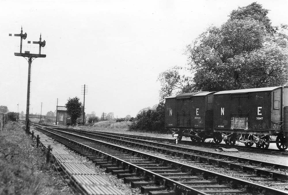Looking towards Redditch with the junction to the GWR's Bearley branch line seen to the left of the GWR locomotive shed located behind the tree