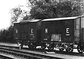 Close up of the two 10ft wheelbase, unfitted, 12 ton ex-NE vans standing in Alcester's goods yard