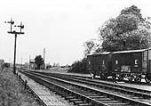 Looking towards Redditch with the junction to the GWR's Bearley branch line seen to the left of the GWR locomotive shed located behind the tree