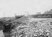 View of one of the flood damaged bridges carrying the line over the River Arrow between Alcester and Wixford in January 1901
