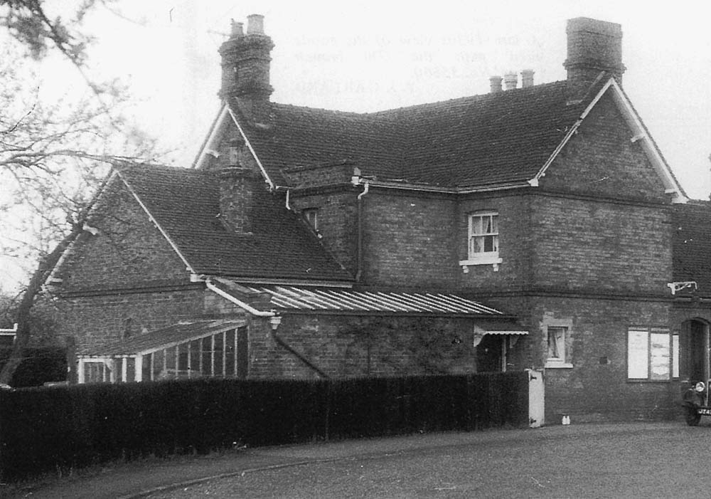 Close up showing the substantial station masters house and the lean-to green house provided to the property