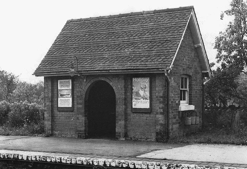 The up platform's substantially built but sparse passenger waiting room