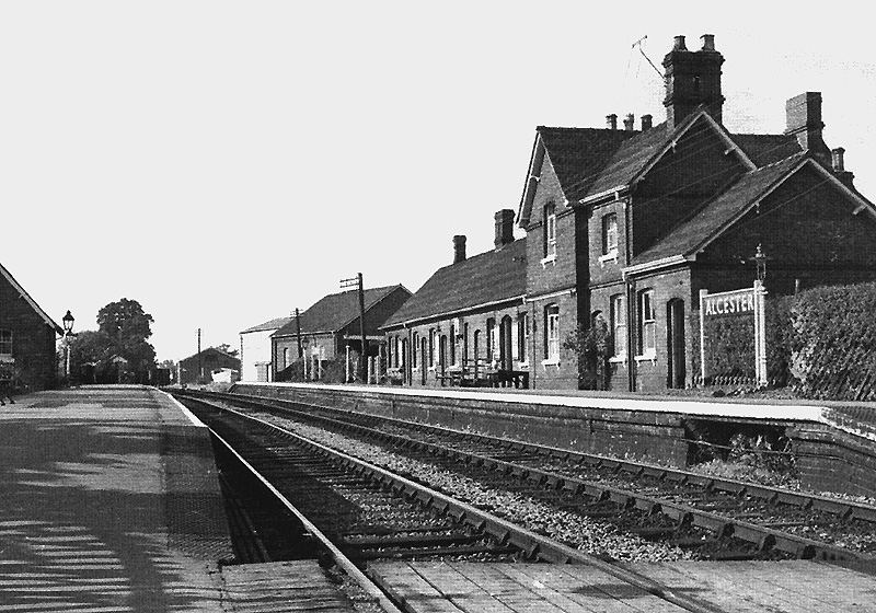 Looking along the up platform towards Redditch from the Broom end of the station with the main platform buildings on the right