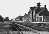 Looking along the up platform towards Redditch from the Broom end of the station with the main platform buildings on the right