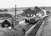 Close up showing  the sacks being filled direct from the wagon into the coal lorry