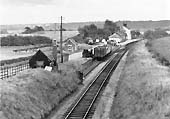 Looking south towards Evesham with on the left coal wagons being unloaded on the single line siding