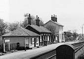 Looking along the station with the siding's buffer stops to the left and the ground frame structure to the right