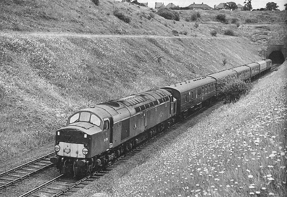 Diesel locomotive D215 'Aquitinia' is seen leaving the western end of Arley Tunnel on a diverted express service on Sunday 3rd July 1966