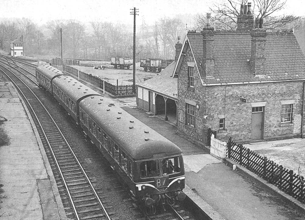 A three-car Craven DMU set passes through the closed station on Sunday 7th April 1963