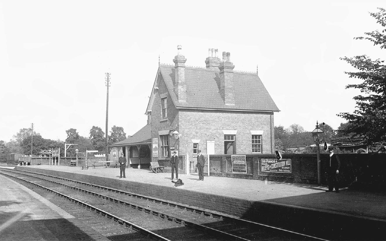 An Edwardian view of Arley & Fillongley station with station staff posed on the down platform