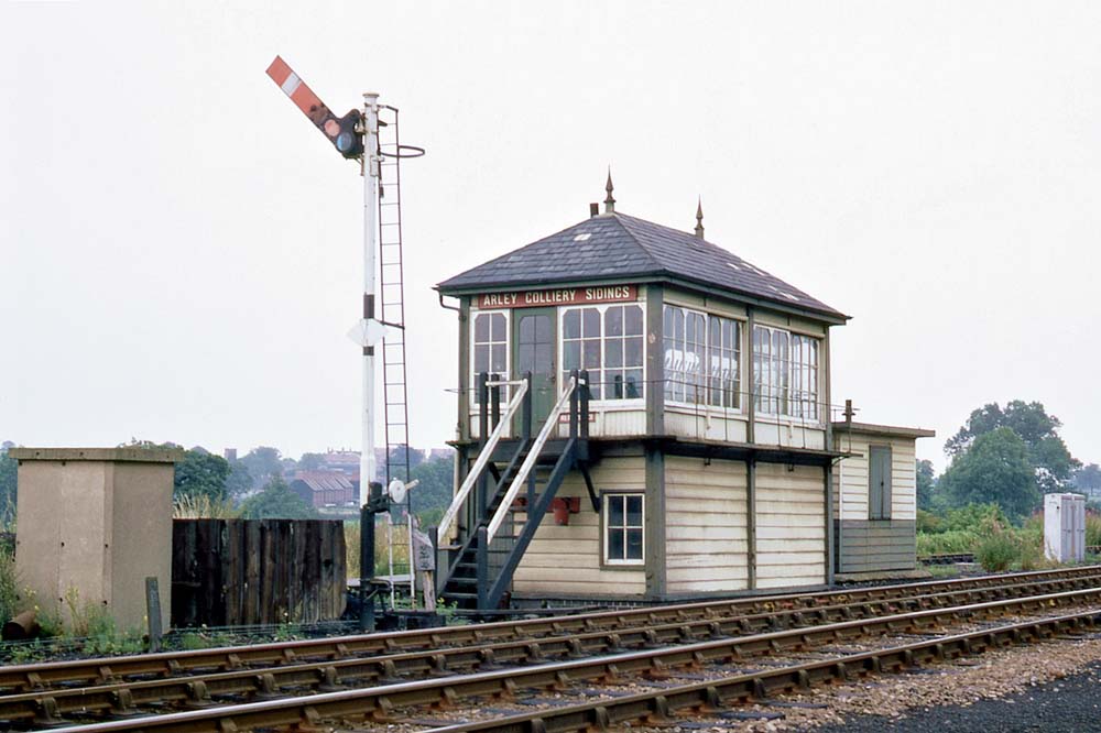 Reverend John Thomas Stain and his brother William pose on the running plated of MR2-4-0 No 104 at the turn of the century