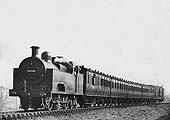 LMS Deeley 0-6-4T 'Flatiron' No 2038 on a Redditch to Birmingham New St local passenger train