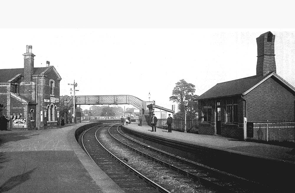 Looking along the Redditch branch's up platform towards the Birmingham to Gloucester mainline