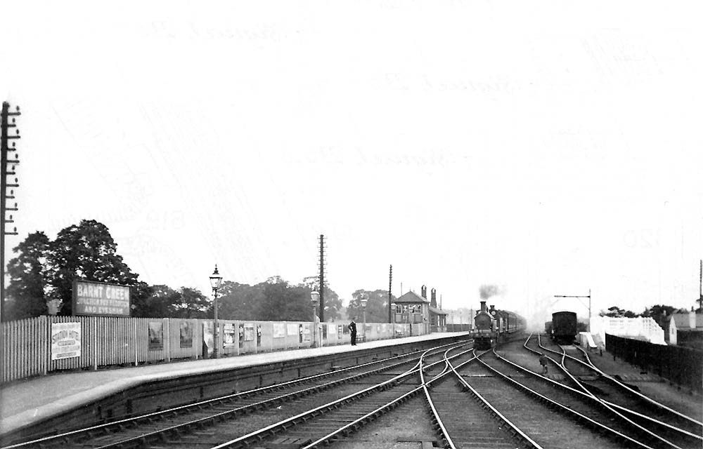 This Edwardian view of the original up platform shows the track layout to the north of the junction