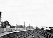 This Edwardian view of the original up platform shows the track layout to the north of the junction