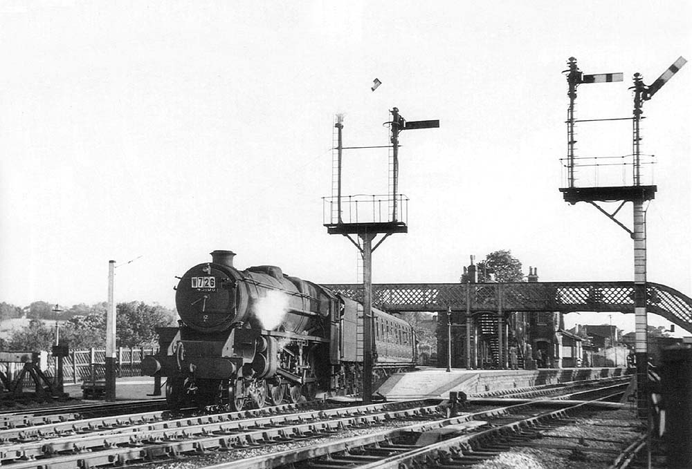 Ex-LMS 4-6-0 Class 5 No 45106 on a Western Region special train is seen coming off the Redditch branch on 9th July 1955