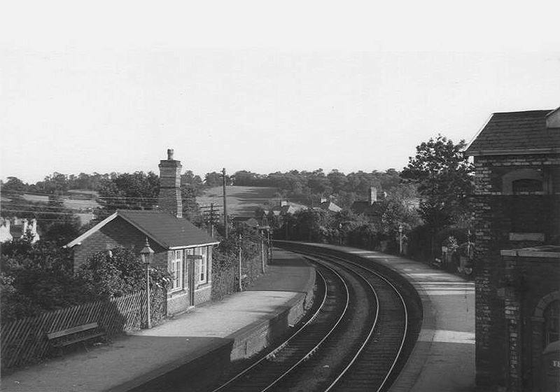 View of the Redditch branch down passenger waiting room devoid of the surrounding shrubbery on 9th July 1955