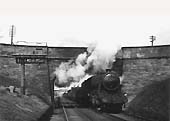 Ex-LMS 2-8-0 No 48351, built by the War Department, is seen at the head of a goods train for Gloucester on 24th April 1954