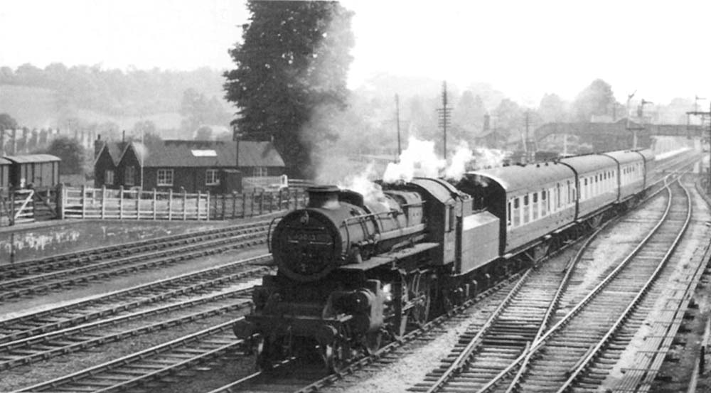 British Railways built Ivatt 2-6-0 4MT No 43013 is seen on an up local passenger service from Bromsgrove on 8th June 1953