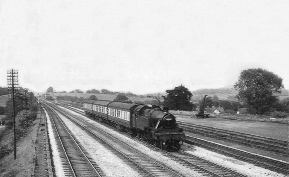 Ex-LMS 2-6-2T No 40099 approaches Barnt Green on a Birmingham New Street to Redditch local service