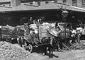 Close up showing the variety of goods being off-loaded from railway wagons for onward distribution