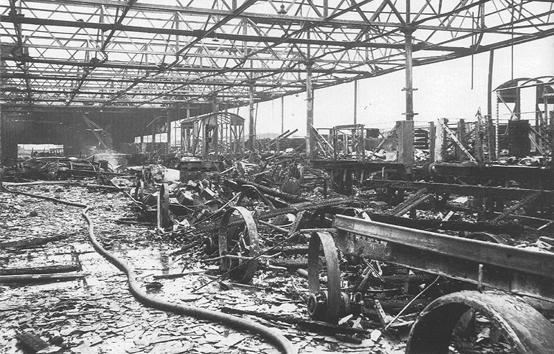 View of the charred remains of the lorry/dray loading platform following the raid on 25th October 1940