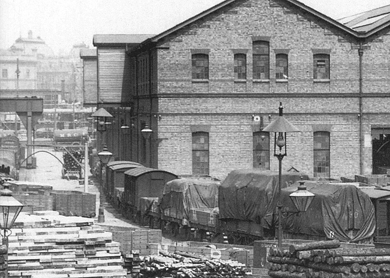 Close up showing the siding running adjacent to the wall on the Holliday Street side of the warehouse