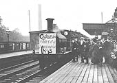 The third excursion train of Cadbury employees to the White City, headed by a Johnson 0-6-0, stands at the up platform