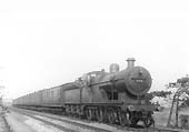 Ex-MR 2P 4-4-0 No 365 photographed heading a seven coach train near Bournville on Wednesday 2nd October 1929