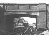 Bournville station, seen through the arch of the bridge carrying Maryvale Road, on Sunday 12th September 1954