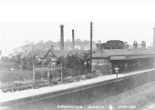An Edwardian view of the station with the station buildings being located on the up, the original, platform