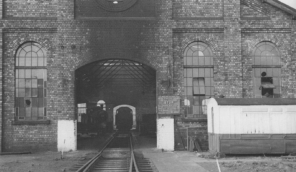 Bournville shed's entrance with the Midland Railway 'Stop' warning sign on the right despite the MR having closed some thirty years previous