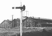 The home signal controlling the northern exit of the Lifford branch, taken in 1956 with the shed in the distance