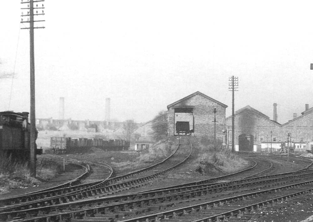 Close up showing the ramp up to the coaling stage, the coal wagons stored on the left and the coaling road to the immediate right
