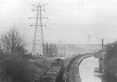 A view of the Lifford canal branch with a train of empty wagons heading in the Bournville direction