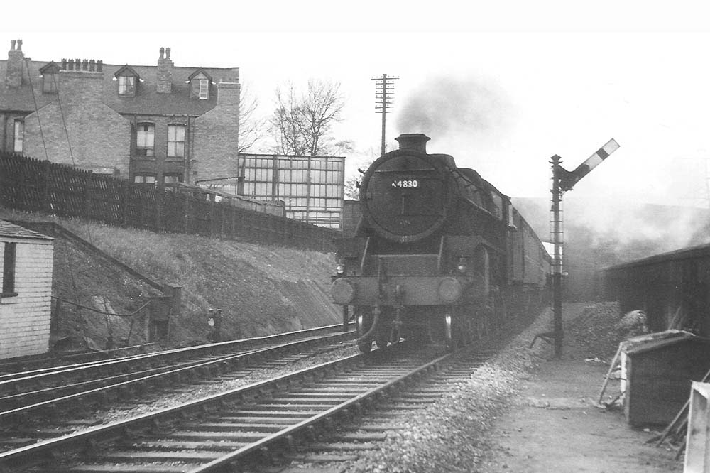 An interesting lineside view of a southbound express passing the signal after the Maryvale Road bridge