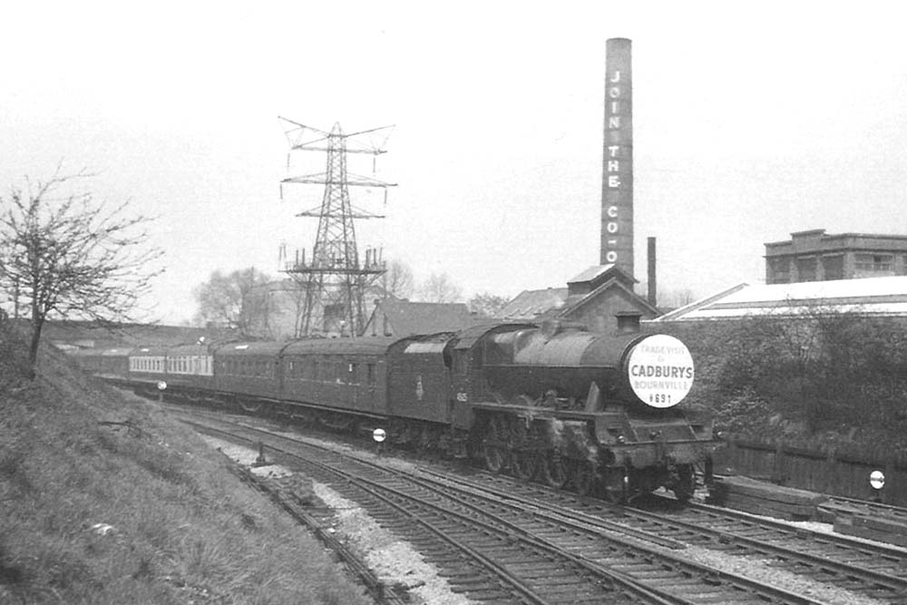 View of the stock of a Cadburys trade visit special headed by clean Jubilee class 4-6-0 No. 45625 'Sarawak'