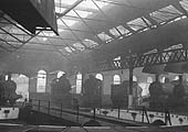 Mostly ex-MR locomotives are seen standing inside Bournville roundhouse in September 1957