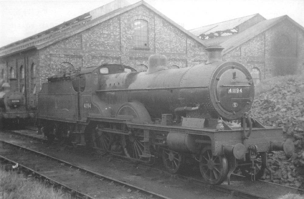 Fowler 4P 4-4-0 No 41194, looking clean and with a tender full of coal, was photographed in a siding at the depot circa 1955
