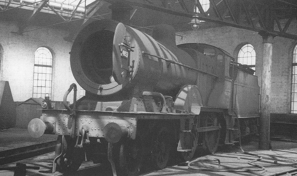 A view of ex-MR 2P 4-4-0 No 40537, paired with a Fowler tender, in the roundhouse on Thursday 31st July 1958