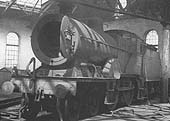 A view of ex-MR 2P 4-4-0 No 40537, paired with a Fowler tender, in the roundhouse on Thursday 31st July 1958