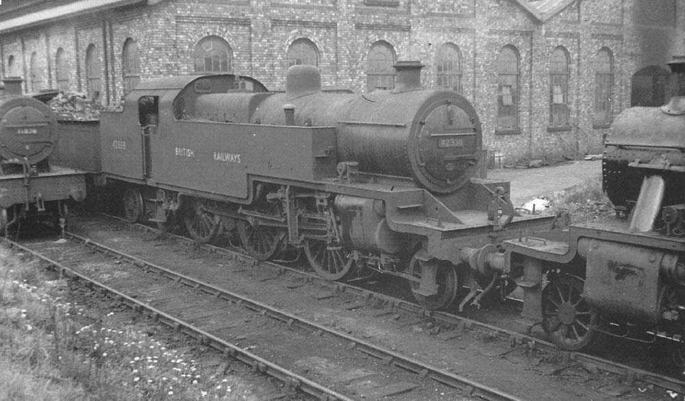 A fine view of Fowler 2-6-4T No 42338, standing with other engines on one of the shed's sidings in the early 1950s