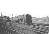 British Railways Standard 9F 2-10-0 No 92058, probably leaving the shed, taken in the summer of 1959