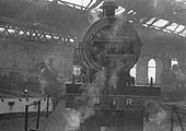 Restored LMS 4-4-0 4P Compound No 1000 is being turned on the turntable inside Bournville shed on 30th August 1959