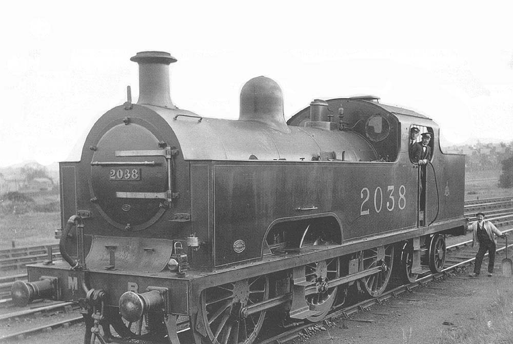 MR 0-6-4T Class 2000 'Flatiron' No 2038 stands at the throat of the yard in August 1919