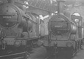 Ex-LMS 4F 0-6-0 No 44516 and ex-MR 2F 0-6-0 No 58167 face the roundhouse's turntable in June 1959